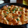 Texas Roadhouse Butter Chicken Skillet served in a sizzling skillet