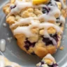 Delicious blueberry lemon scones served fresh for breakfast with a zesty glaze.