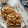 Sunflower seed butter banana toast with caramelized bananas on whole wheat bread