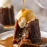 Delicious sticky toffee pudding with dates topped with rich toffee sauce.