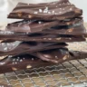 Dark chocolate sea salt bark with crunchy almonds and a sprinkle of sea salt.